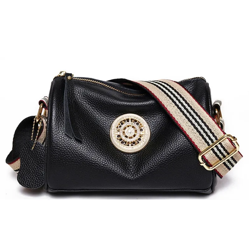 Small and Compact Crossbody Bag with Rotating Charm Accent